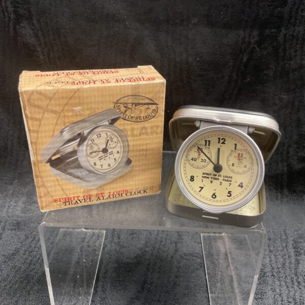 Vintage Spirit of St Louis travel alarm clock with Art Deco design.