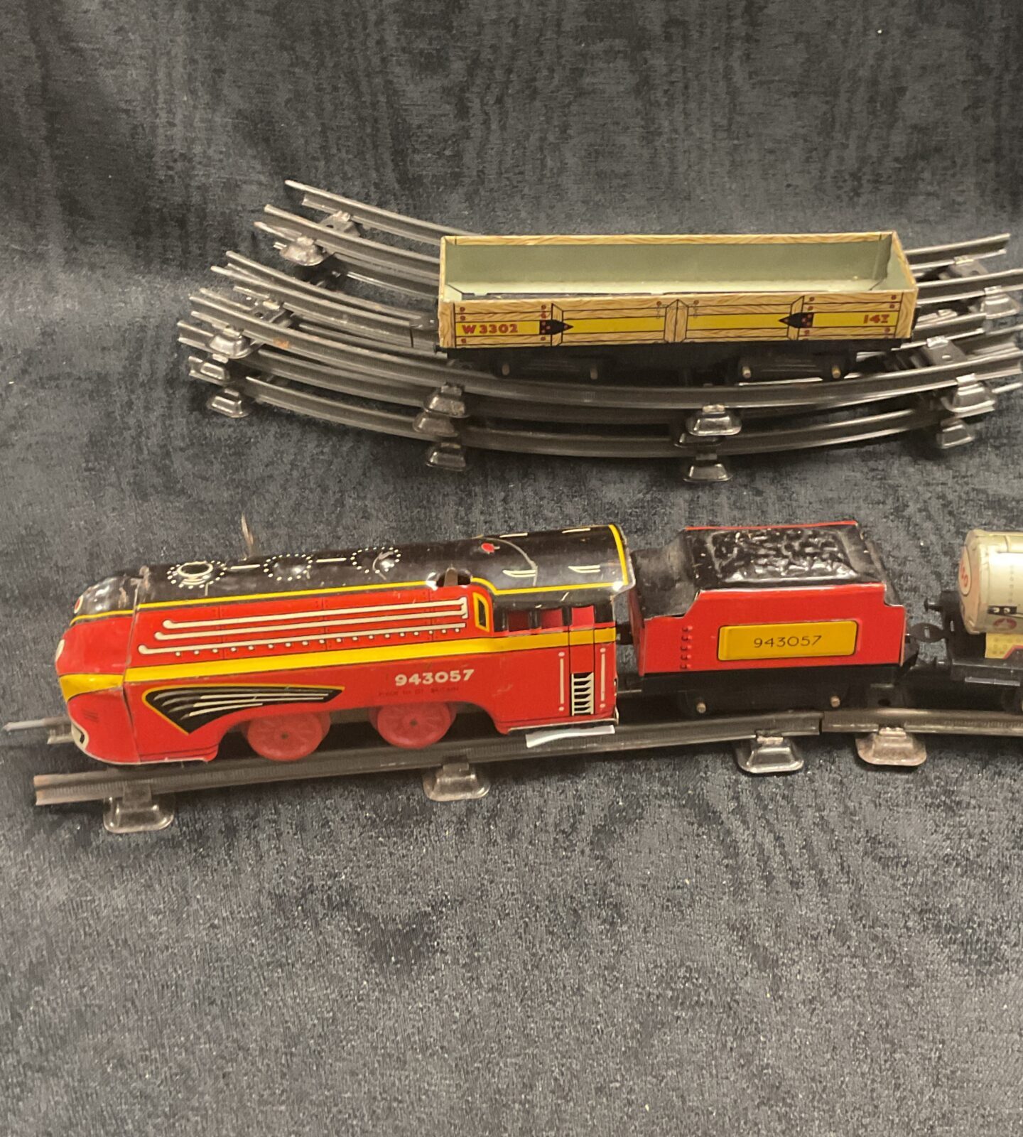 Tinplate clockwork wells brimtoy oo gauge with rolling stock and esso tanker truck with circular track working with key