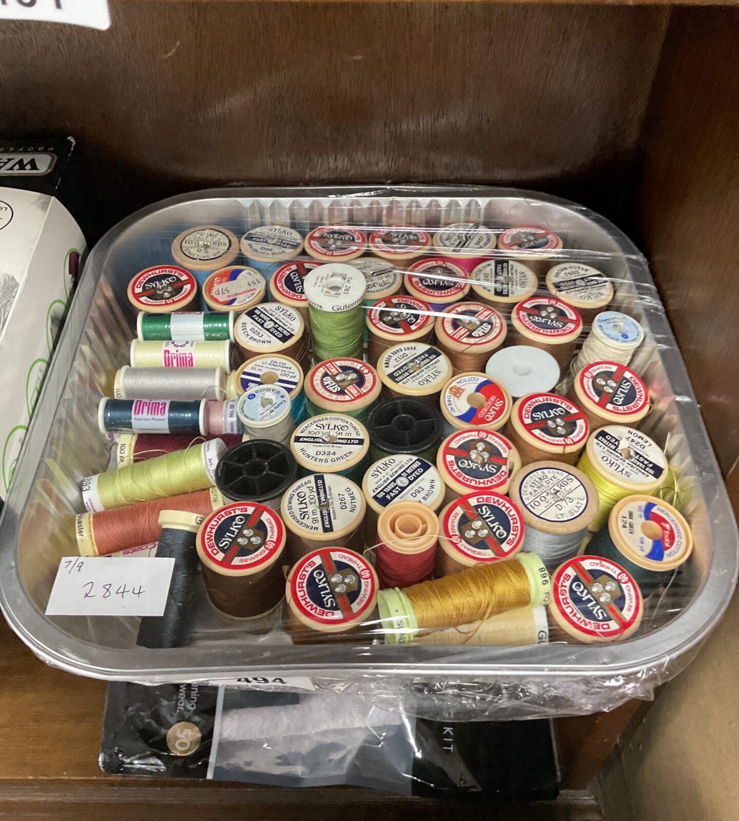 Tray of cotton reels