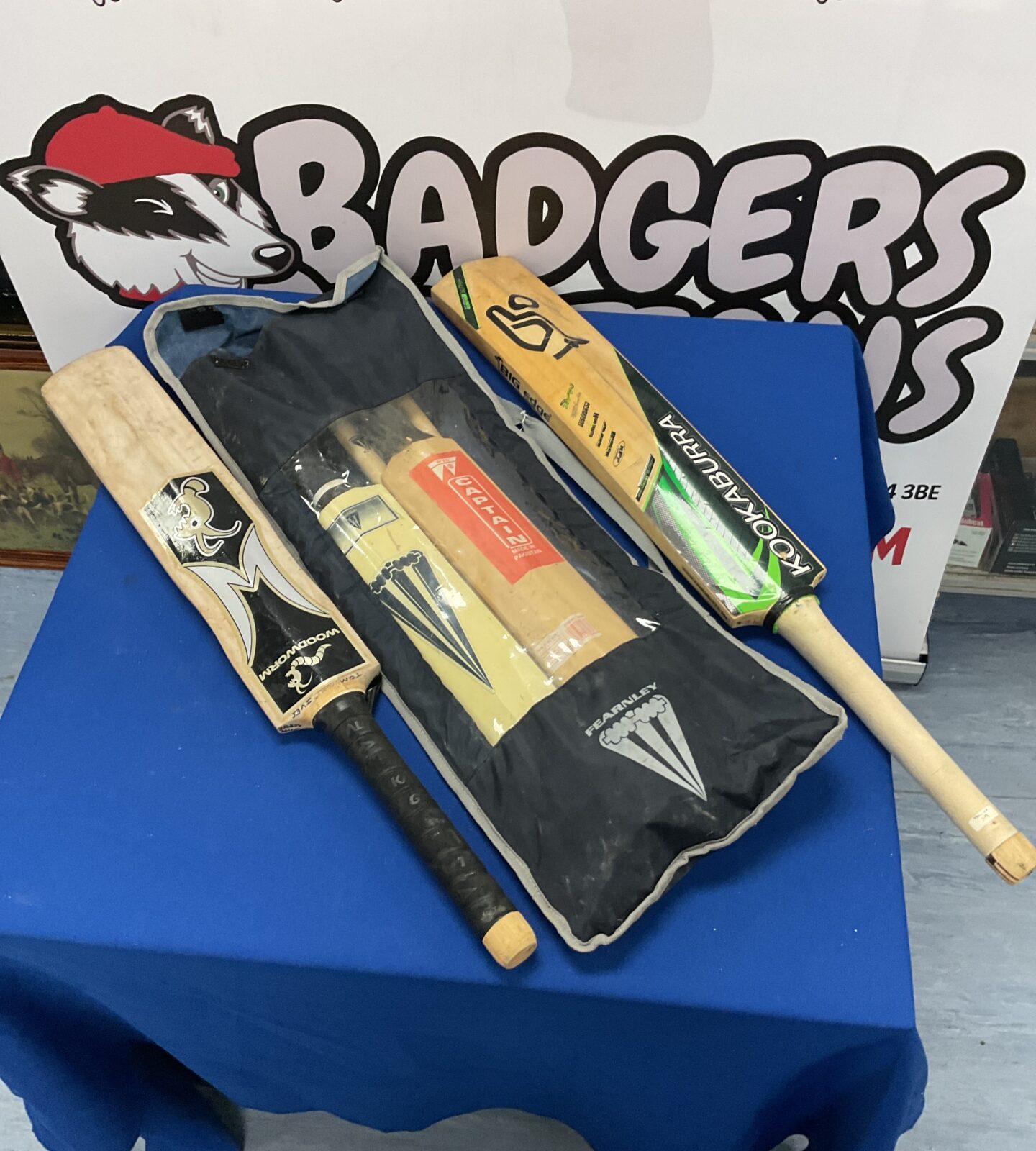 Bundle of cricket bats, including kookaburra and woodworm