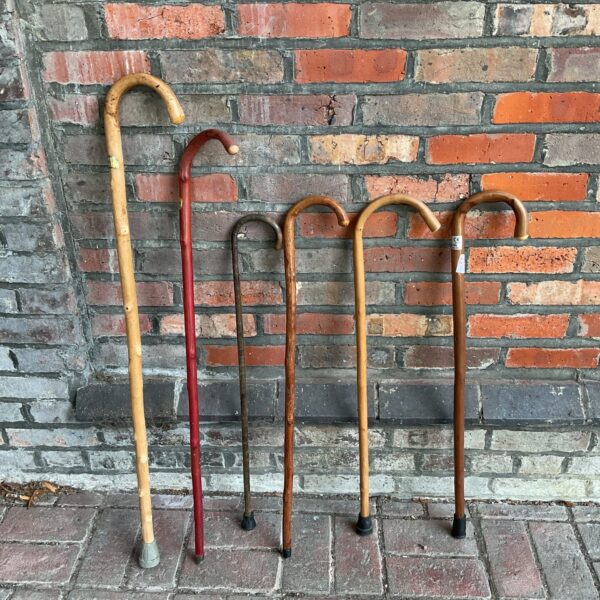 Lot of six vintage walking sticks and antique canes.