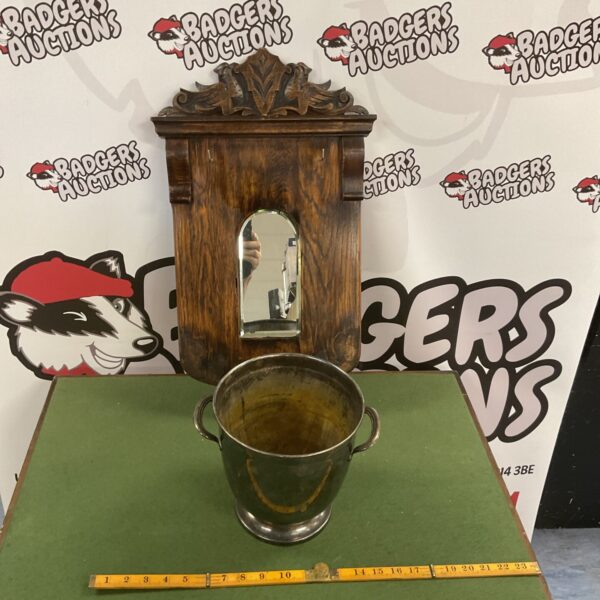 Antique oak hall mirror and silverplate champagne bucket, vintage decor.