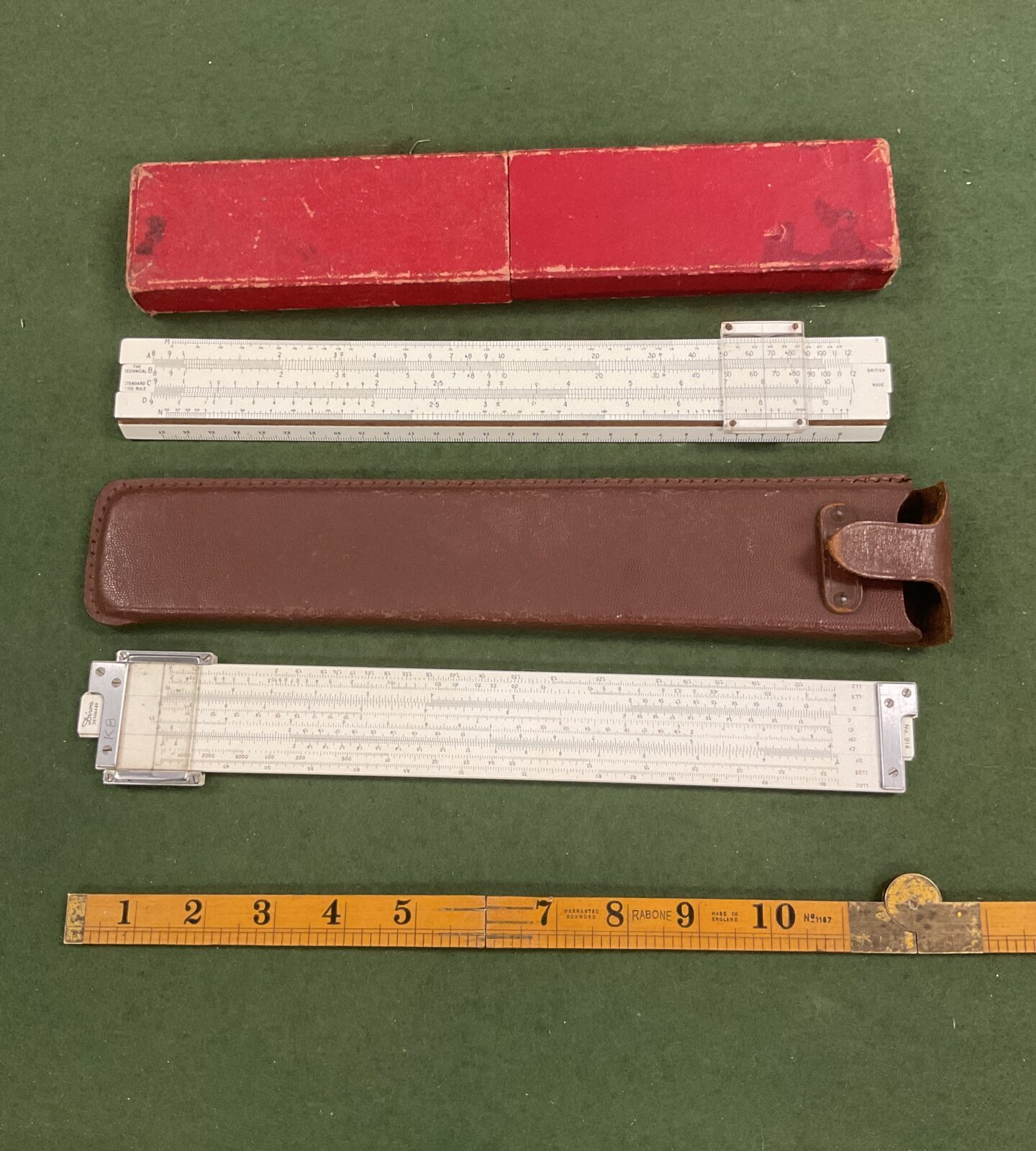 Two vintage Slide rules British made wood rule and Diwa Denmark duplex rule