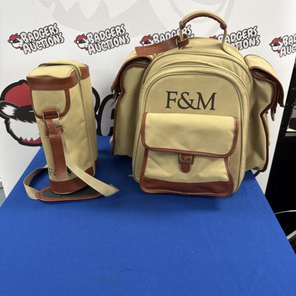 Full view of a vintage Fortnum and Mason picnic set rucksack.