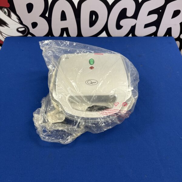 Front view of a vintage Quest sandwich toaster.