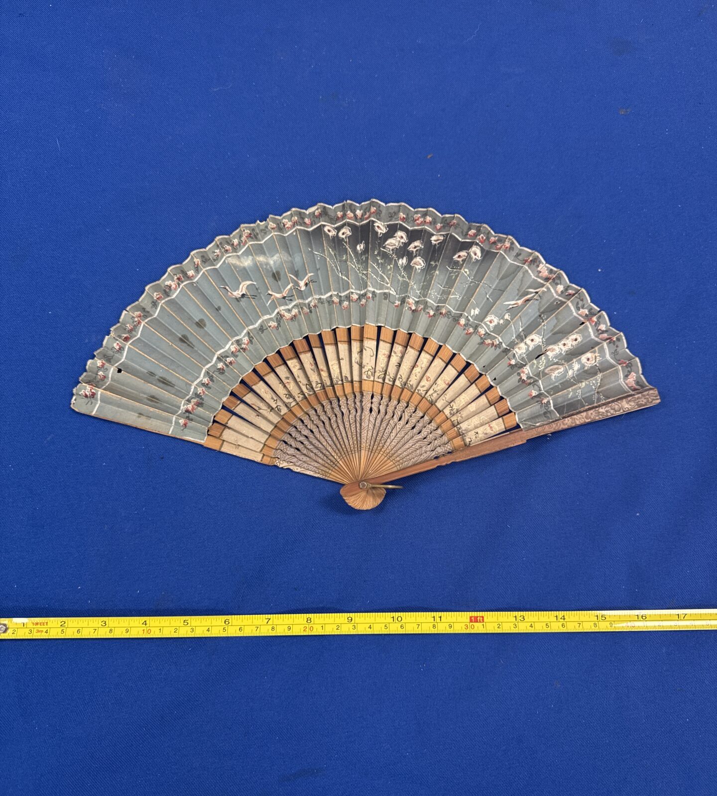 Vintage oriental paper fan