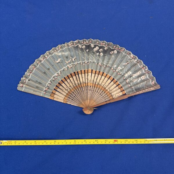 Vintage oriental paper fan