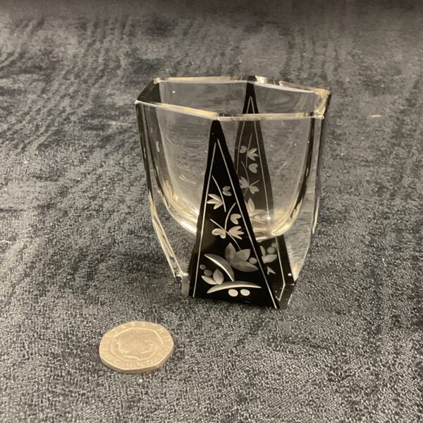 Vintage Art Deco glass vase with black geometric design.