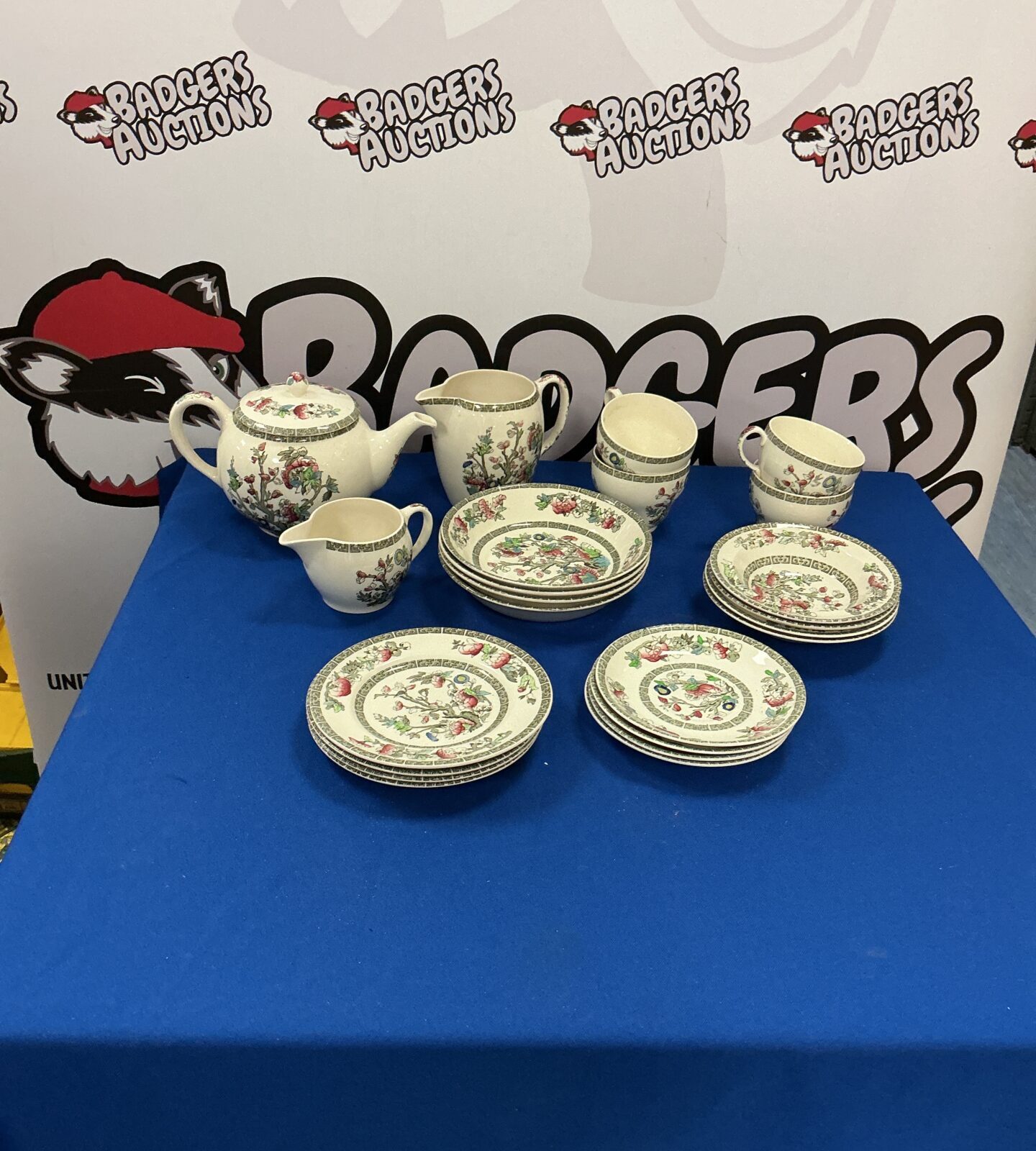 Vintage Johnson Bros Indian Tree china tea set with cups and saucers.