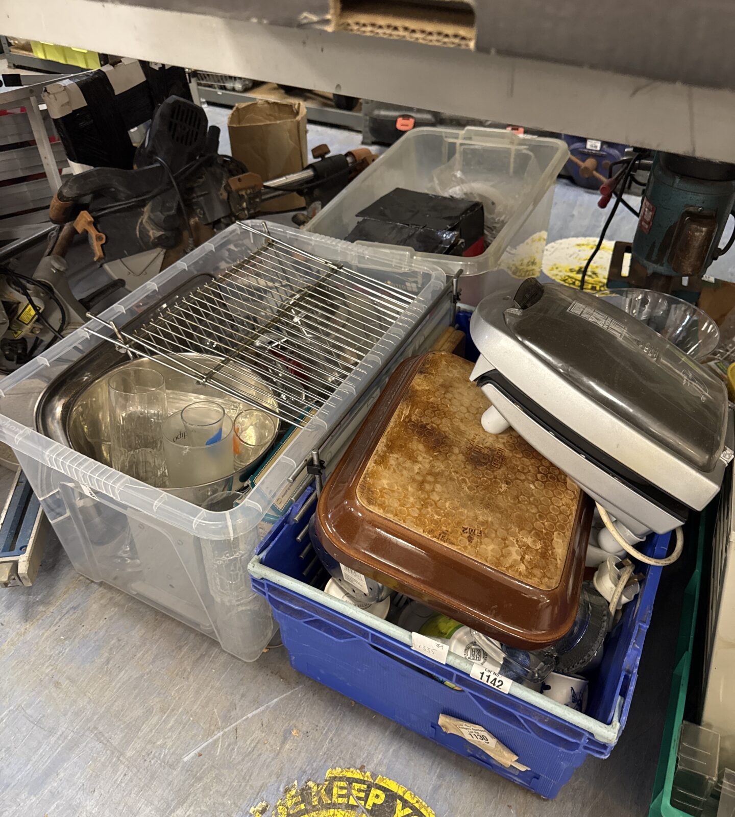 Kitchen clearance lot with crates and a George Foreman grill.