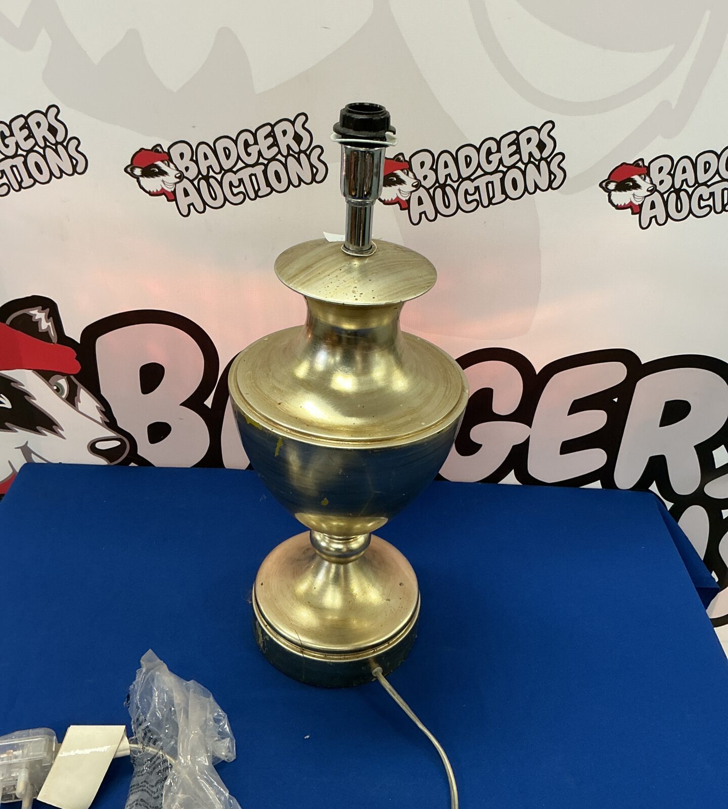 Vintage brass Lizzie Aunt table lamp with tiered base.