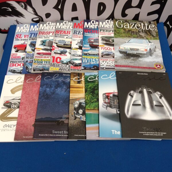 Vintage collection of Mercedes-Benz enthusiast magazines for collectors.