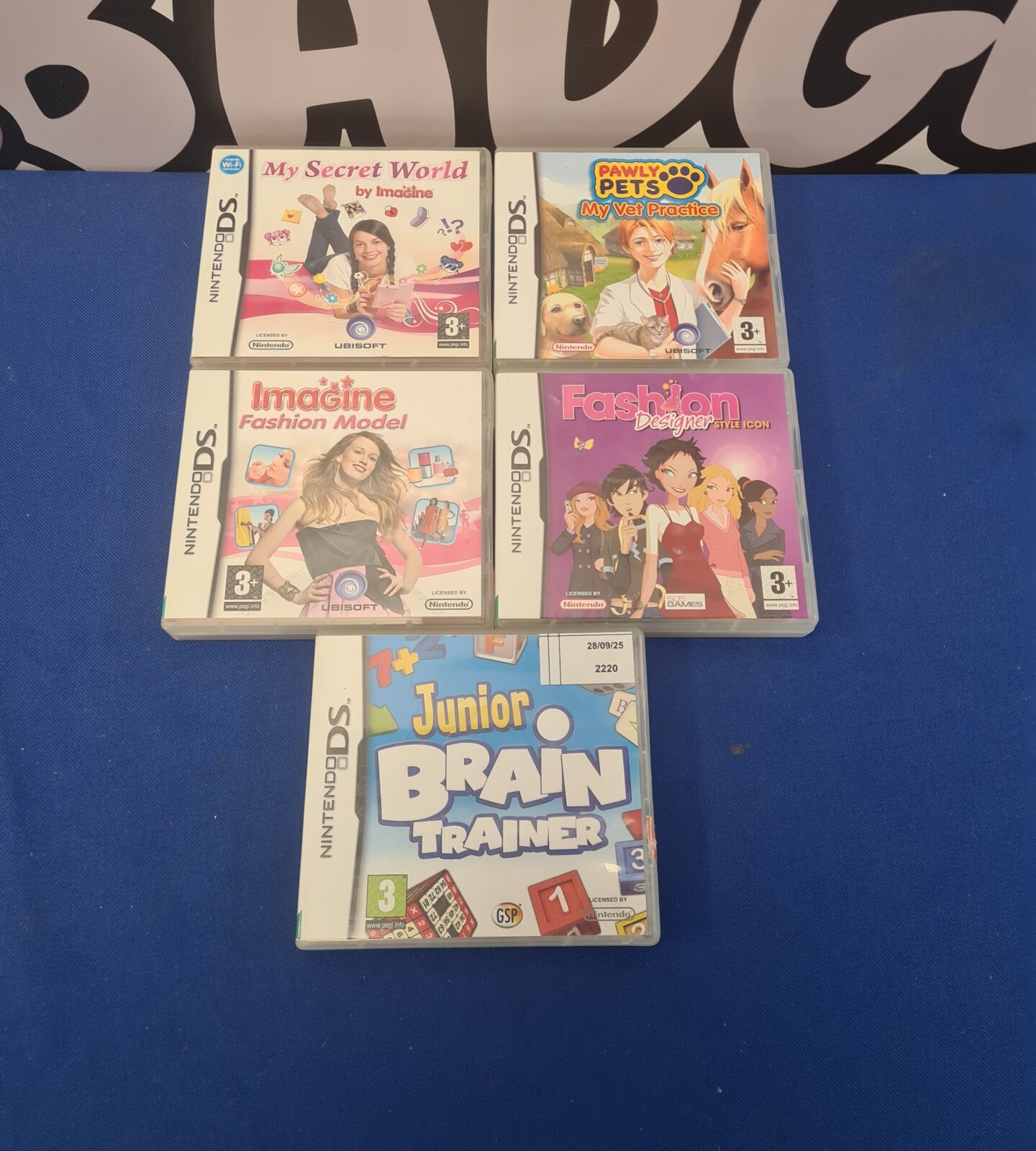 Nintendo DS games lot including Brain Trainer and Fashion Designer.