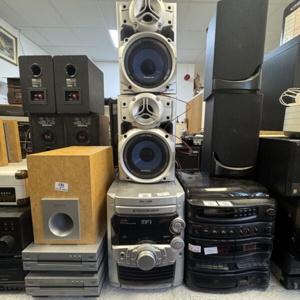 Vintage Panasonic SA-AK220 5 CD changer stereo system with speakers.