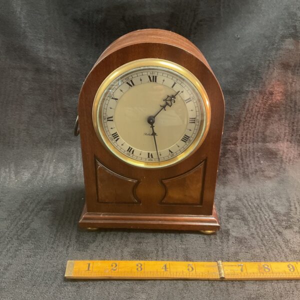 Vintage 1970s Rotherhams mantle clock with wooden casing.