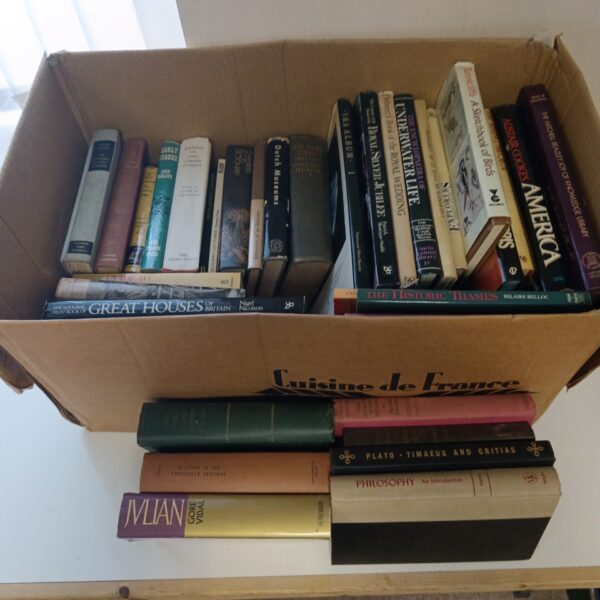 Vintage book lot with philosophy and literature titles.