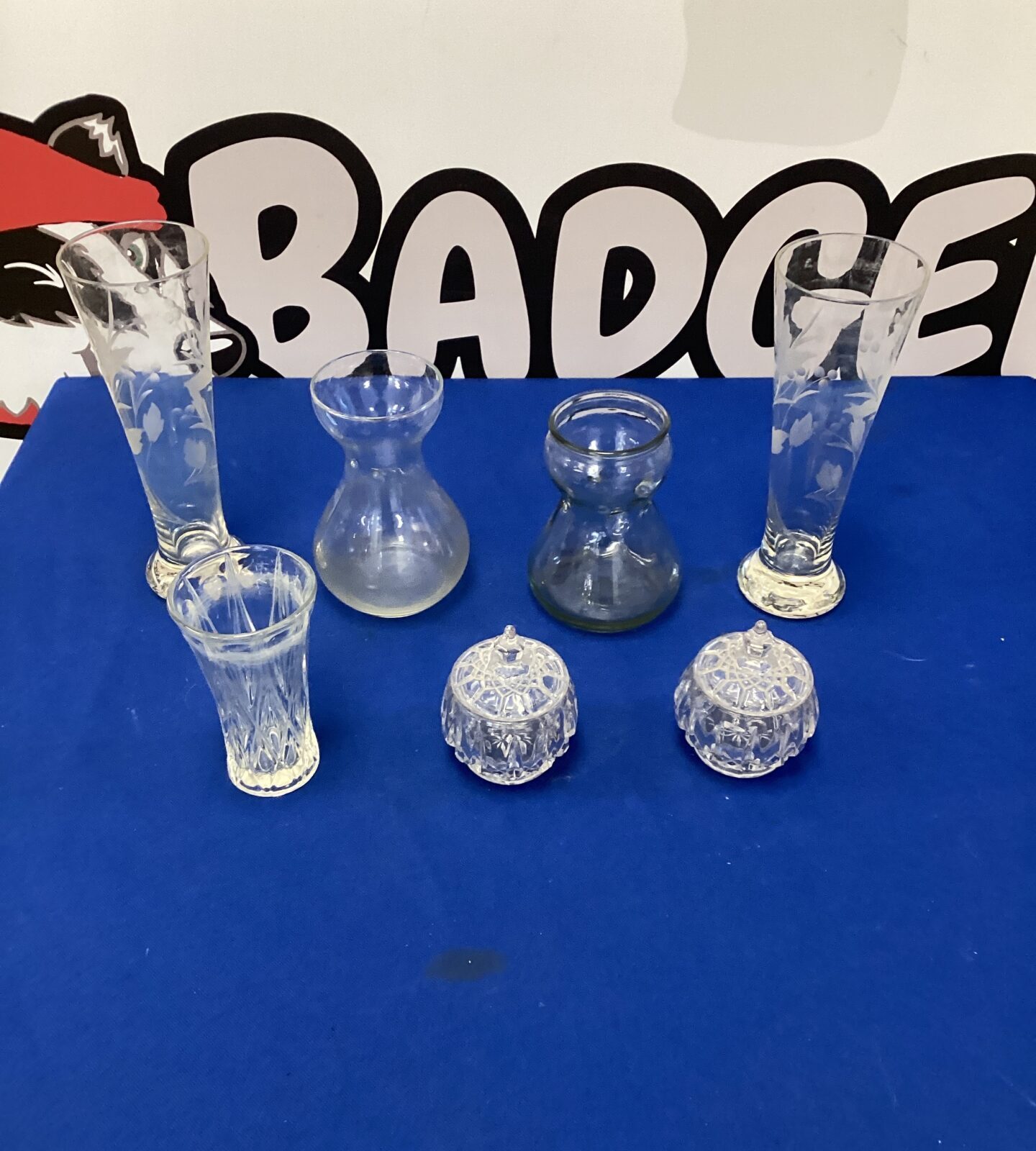 Close-up of vintage glassware, including a carnival glass bowl.
