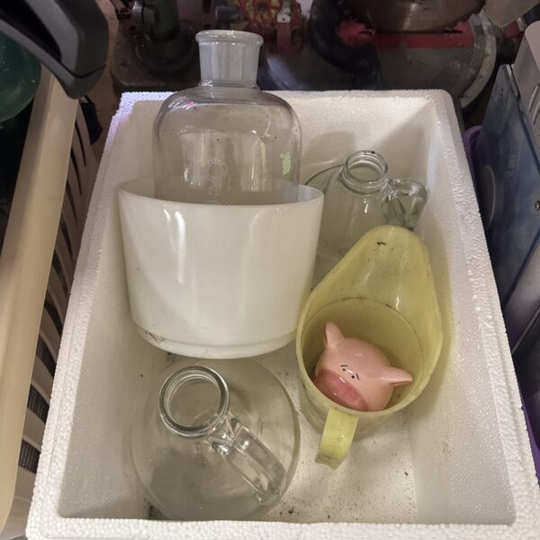 Vintage Pyrex jar with piggy bank and Duckhams oil jug.