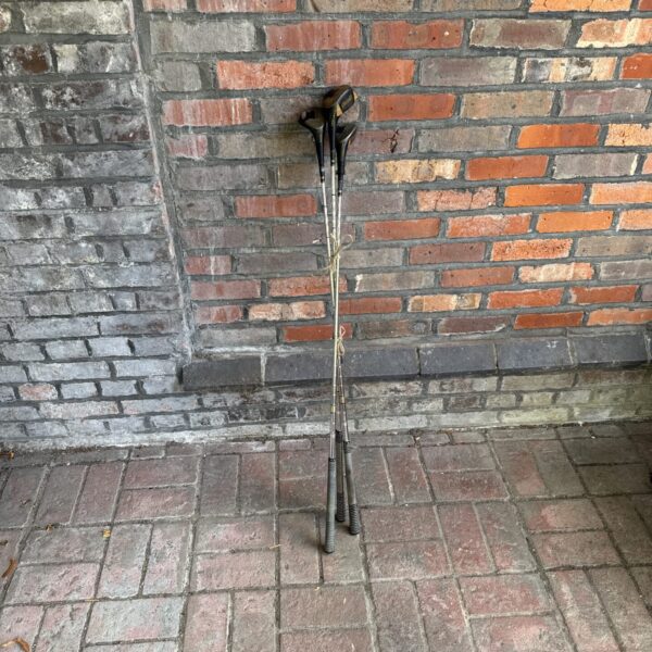 Vintage Wilson golf woods, 1, 3, and 4 irons, classic golf clubs.