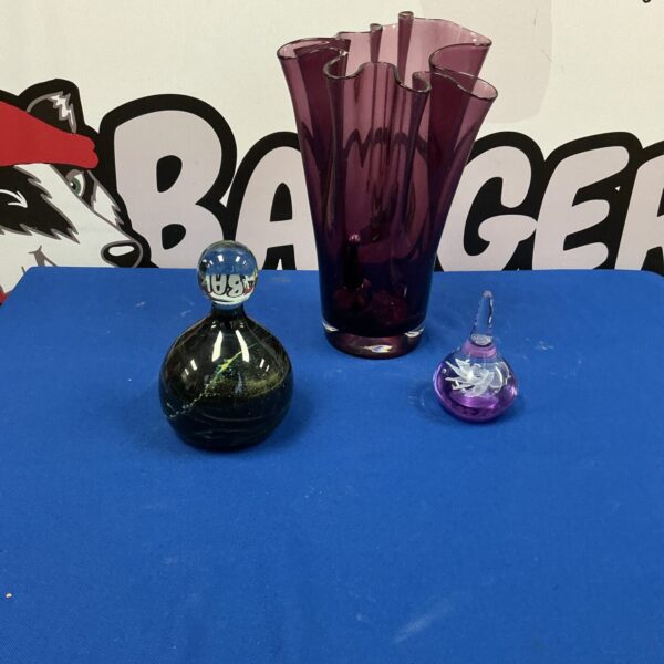 Elegant 15 inch glass vase for floral displays.