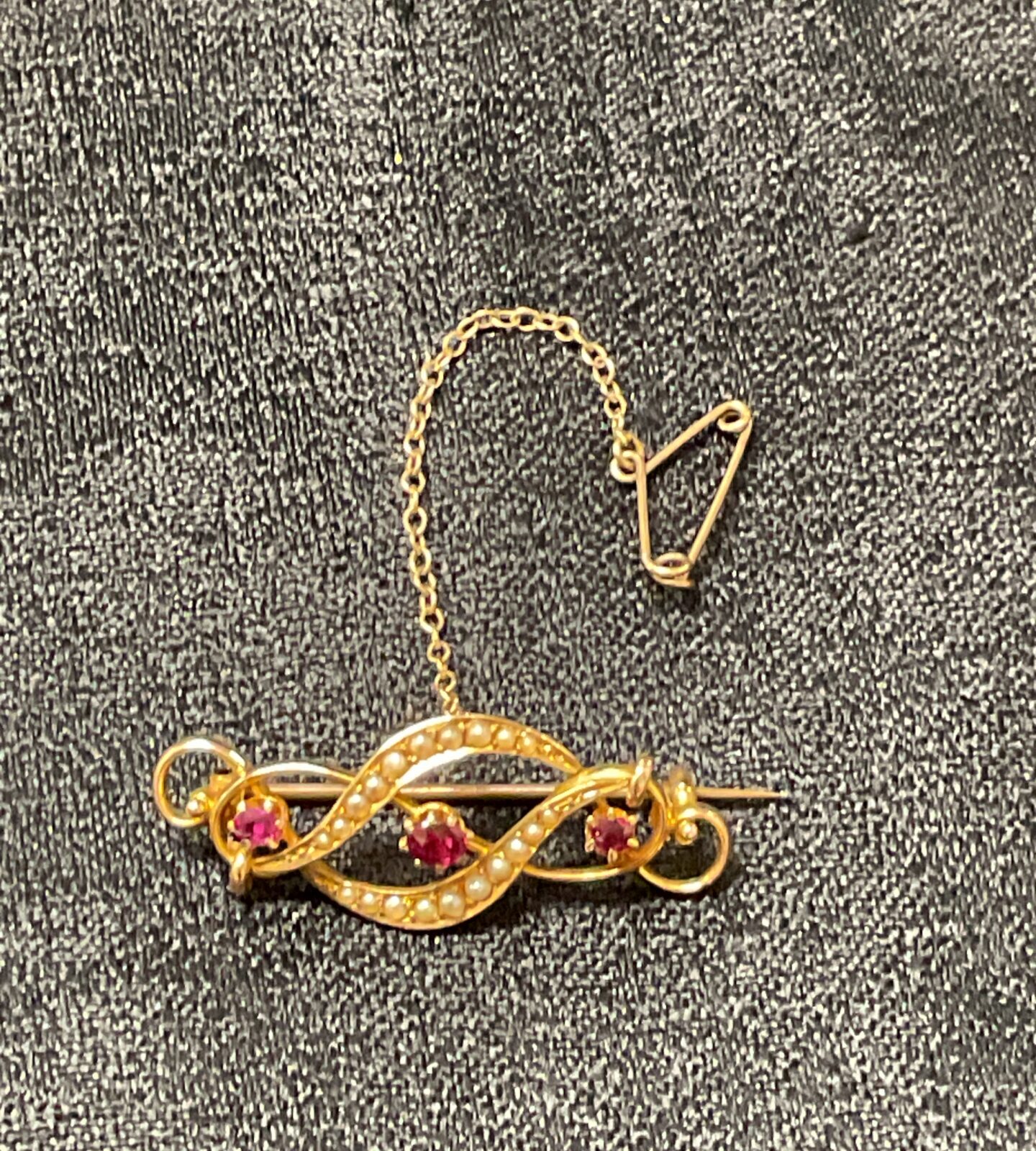 Antique 15ct gold bar brooch with pearls and rubies.