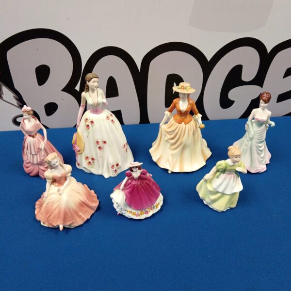 Group of vintage Royal Doulton and Coalport porcelain lady figurines.