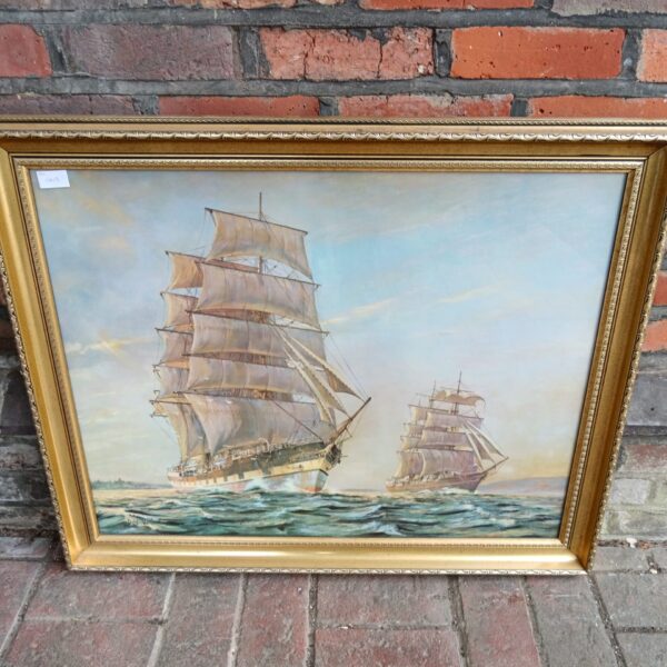 Large Don Vaughan print of sailing ships in a gilt frame.