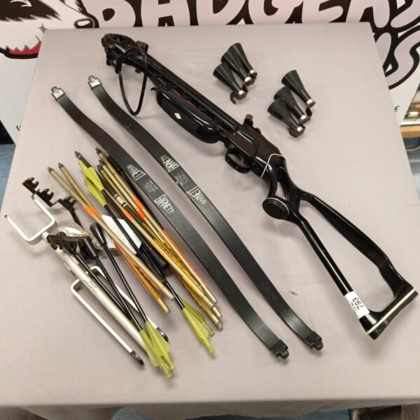 Black Barnett crossbow with bolts, ready for archery or hunting.