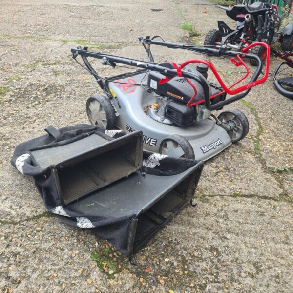 Vintage Masport 250 series lawn mower in used condition.