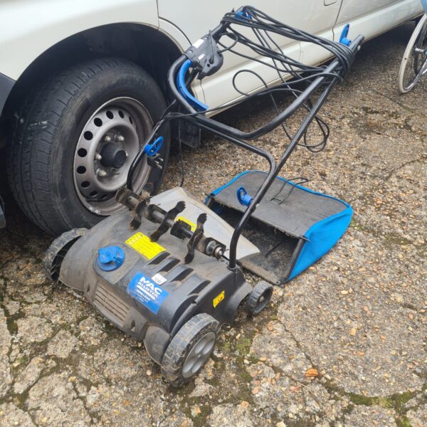 Used MacAllister MRS1400 electric scarifier for lawn maintenance.