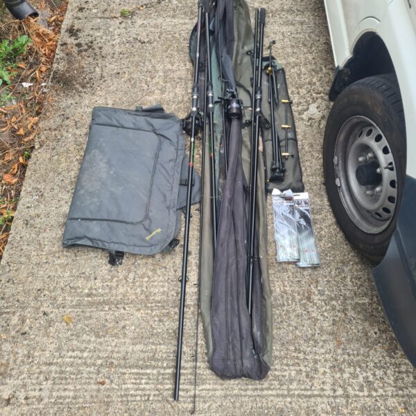 Overview of fishing rod bundle with rods, bag, and hair rigs.