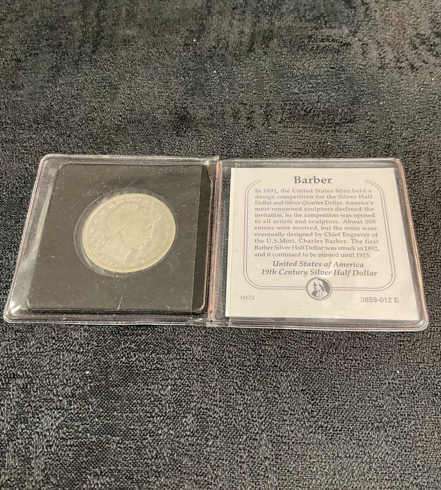Obverse of an 1891 Barber Silver Half Dollar coin.