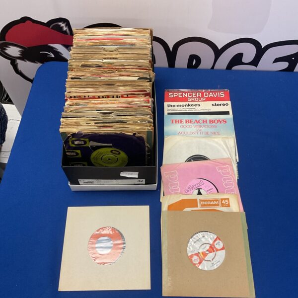 Vintage 1960s 7 inch singles collection of vinyl records.