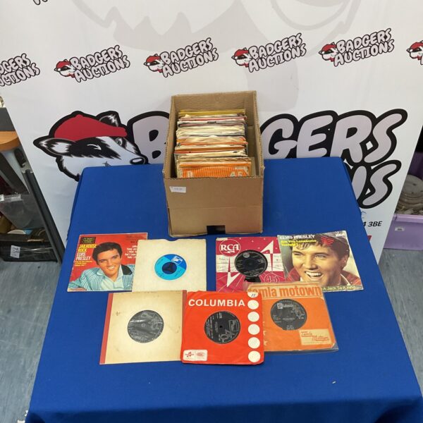 Vintage 1960s vinyl singles collection including Motown and Elvis records.