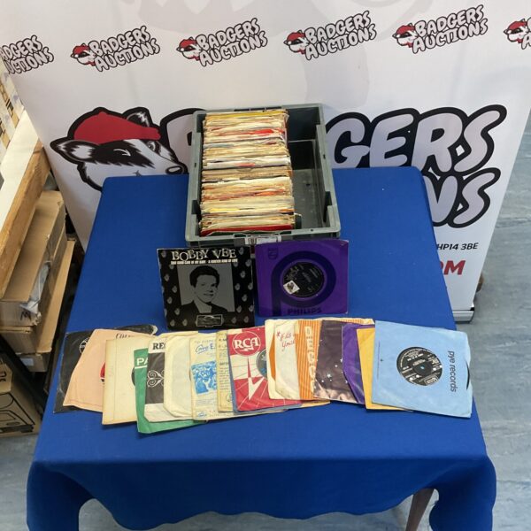 Vintage 1960s vinyl singles collection, a nostalgic music lot.