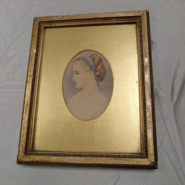 Delicate 19th-century watercolour portrait of a young lady in gilt frame.