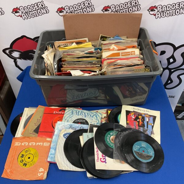 Large lot of vintage 7 inch vinyl records for collectors.