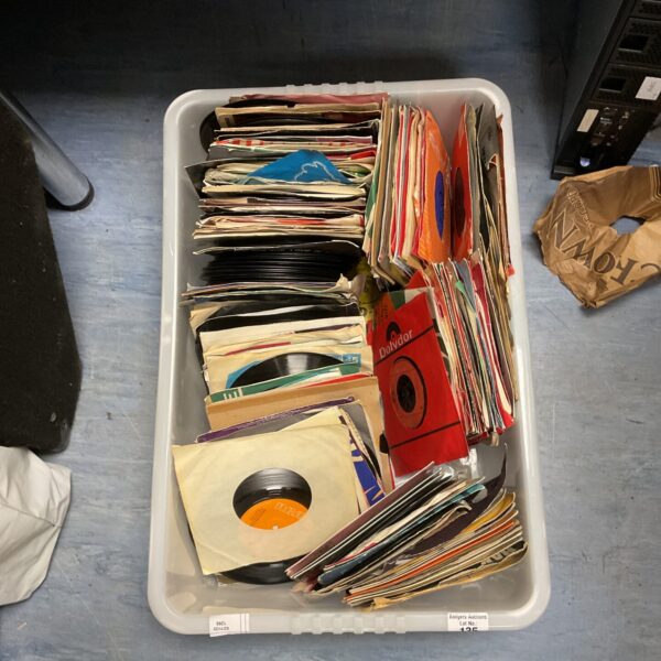 Vintage 7 inch vinyl singles lot for collectors and music enthusiasts.