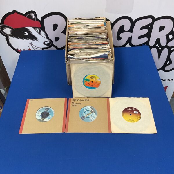 Lot of vintage 70s and 80s vinyl singles for music collectors.