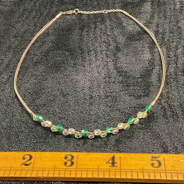 Delicate 925 silver choker necklace with green and white stones.