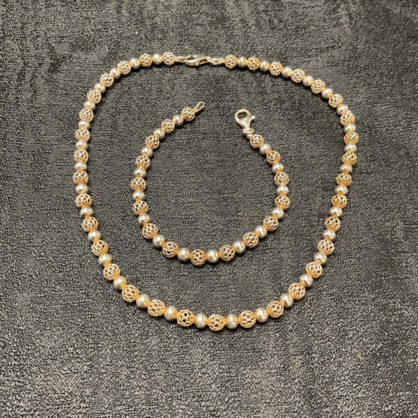 Intricate 925 silver filigree necklace and bracelet set, vintage style.