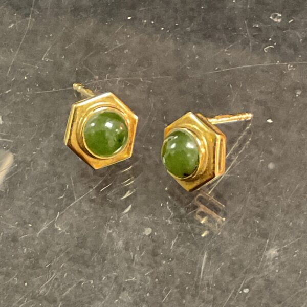 Vintage 9ct gold stud earrings with green stones.