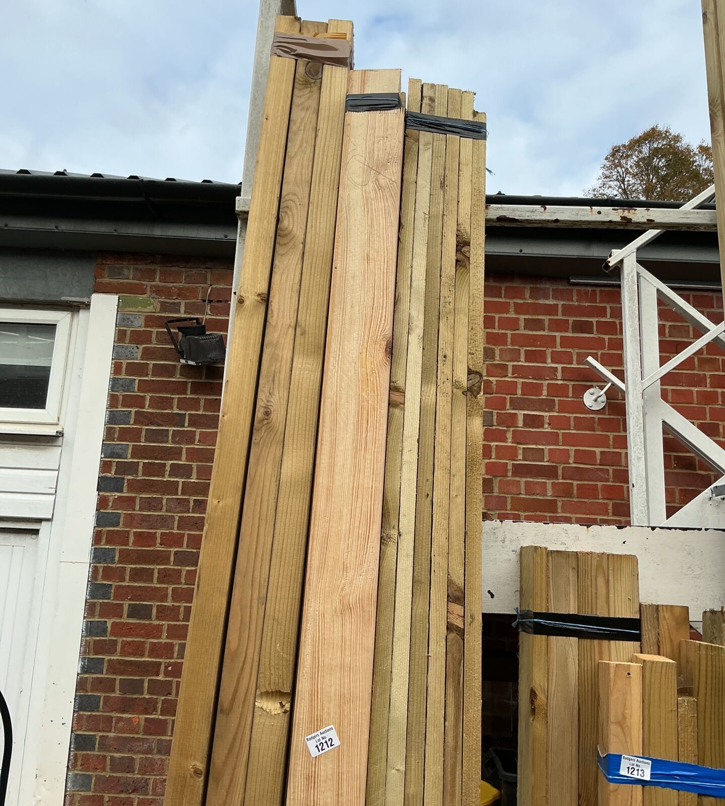 Three bundles of 9ft timber for construction and DIY projects.
