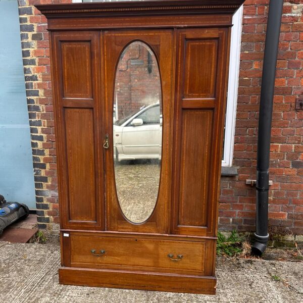 Large 1930s mahogany wardrobe with mirror and inlaid detailing.