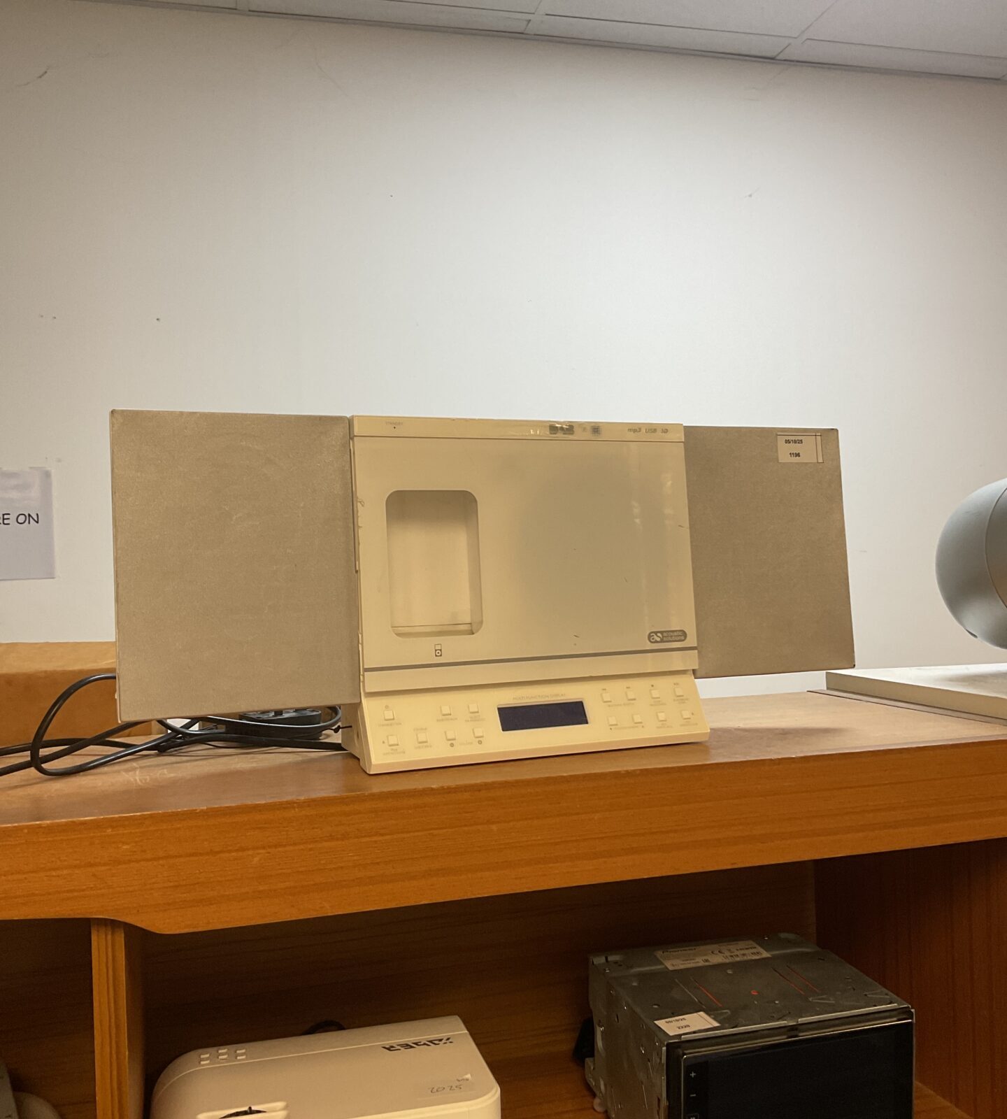 Acoustic Solutions micro hifi system with DAB radio on display.