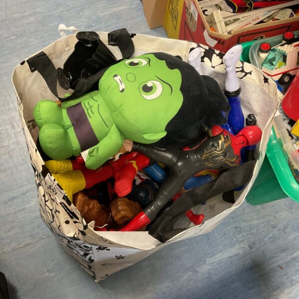 Mixed lot of Marvel and Disney action figures and toys.