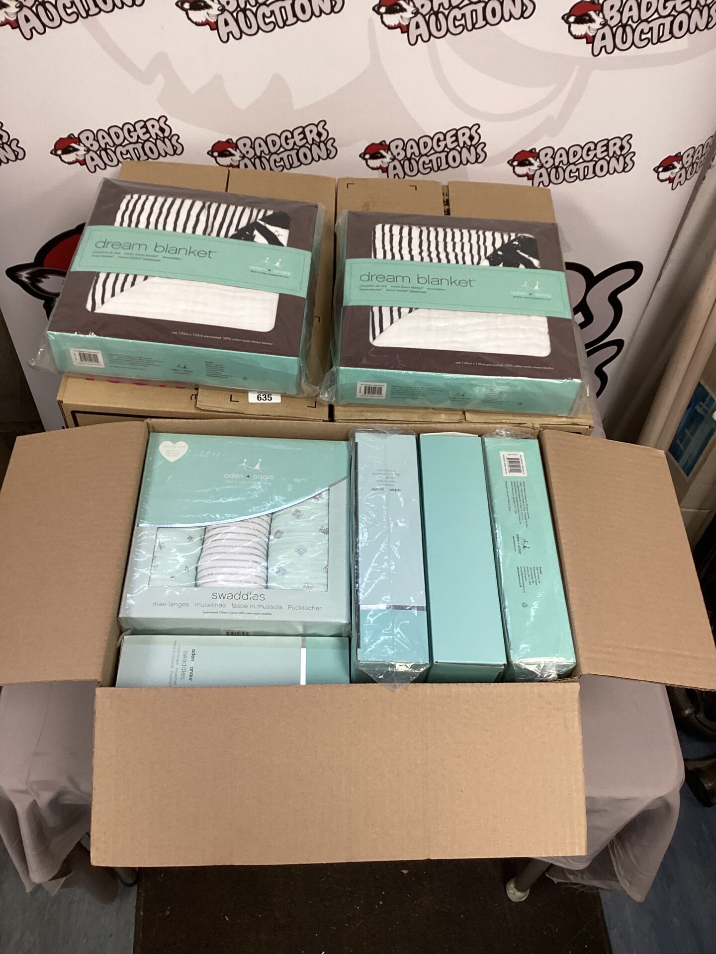 Three sealed boxes of aden & anais baby muslin blankets.
