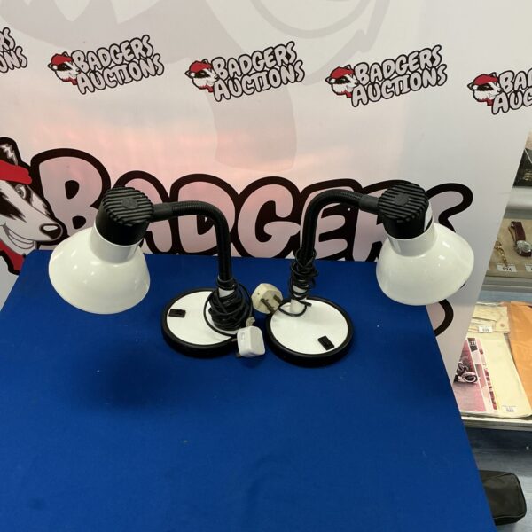 Pair of vintage adjustable reading lamps for task lighting.