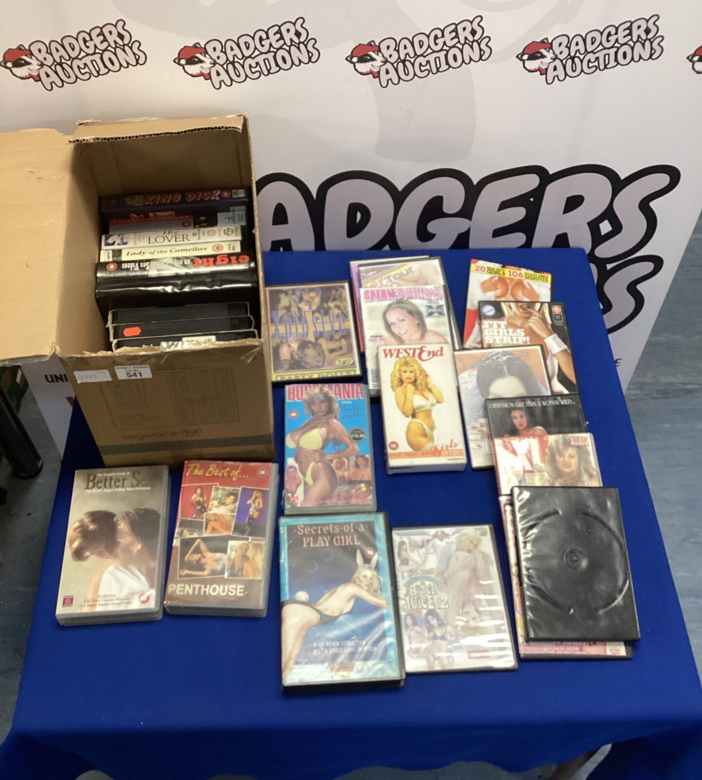 Collection of adult VHS and DVD tapes for collectors.