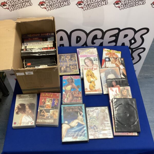 Collection of adult VHS and DVD tapes for collectors.